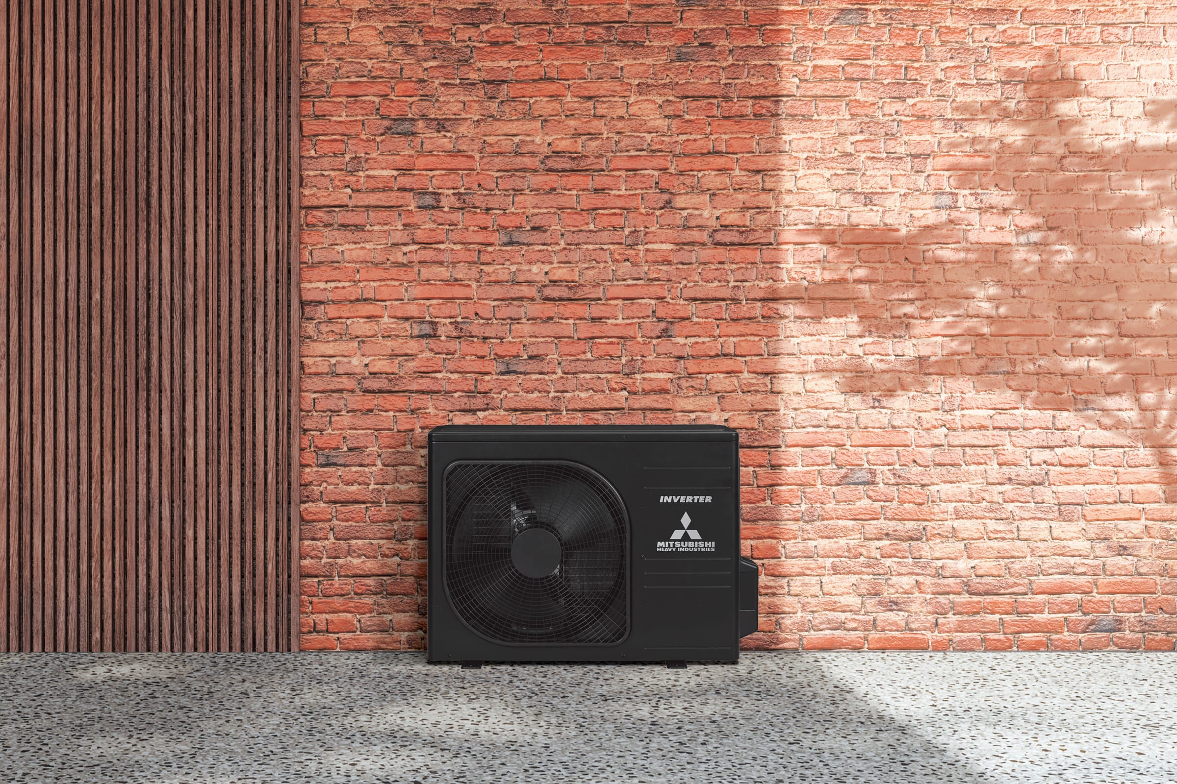 Mitsubishi Heavy Industries Premium ZT juodas lauko blokas SRC50ZT-WB (Jet Black) prie plytų sienos
